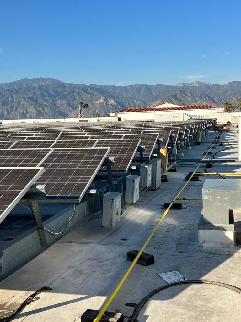 Vertical shot showing solar panel structure or electrical equipment installation.