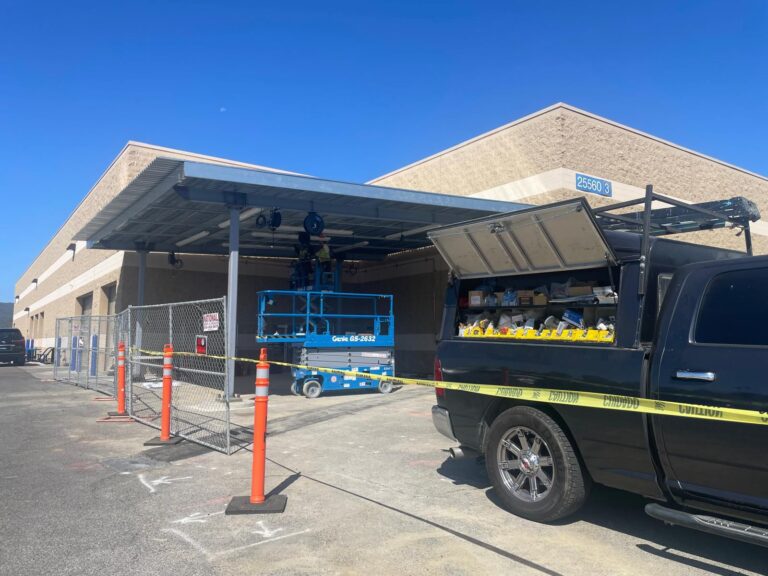 Close-up of solar panels installed on the roof of the Carmax facility.