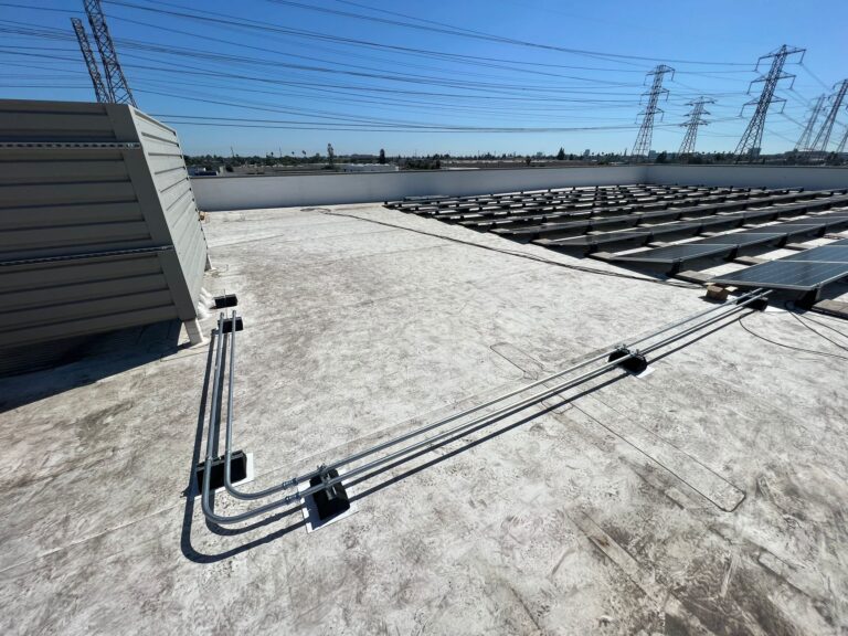 Wide view of the solar installation on a Public Storage facility building.