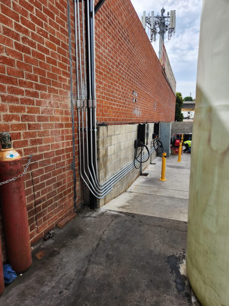 Electrical infrastructure and conduit for the new charging stations before final enclosure.
